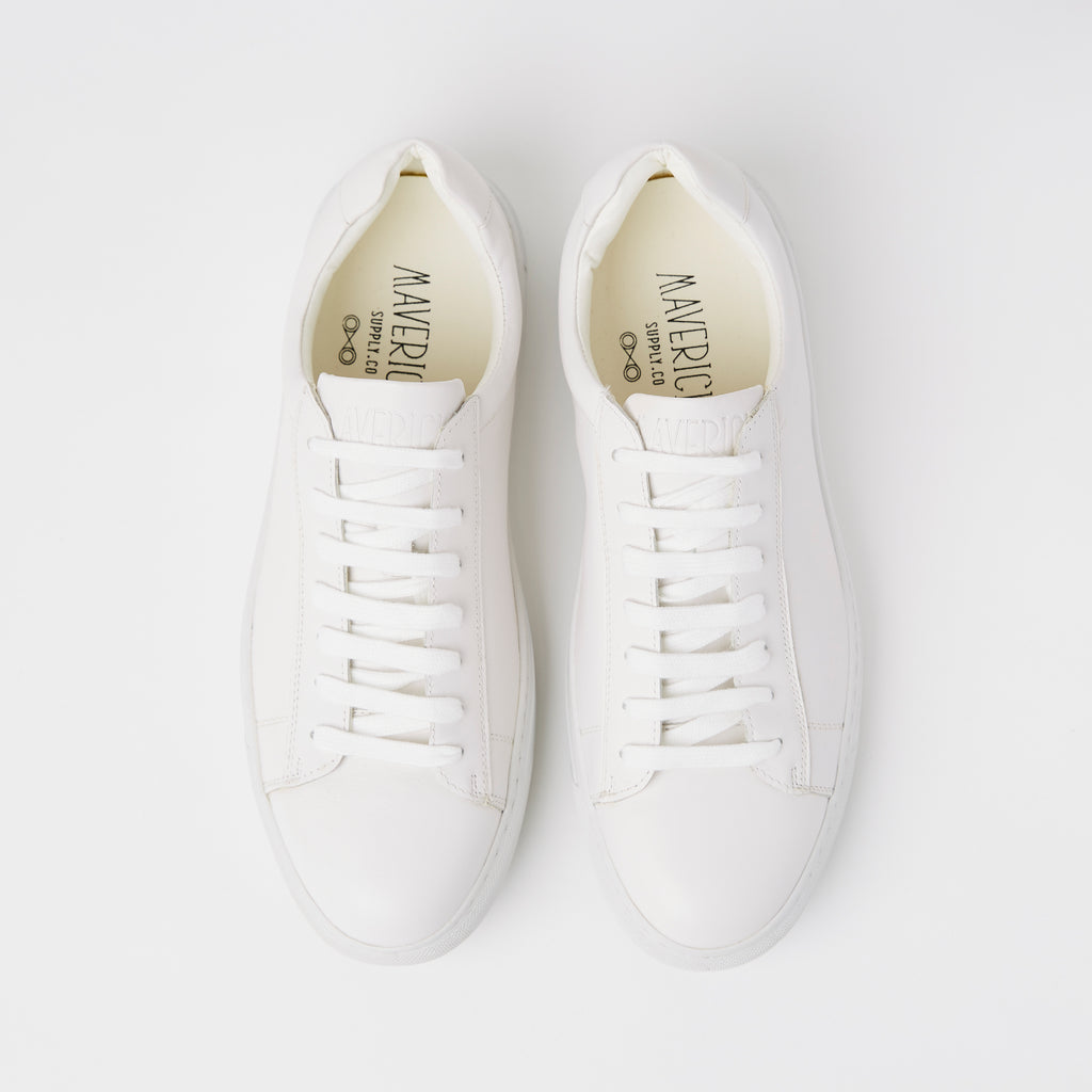 a top view of the mens white leather dress sneaker in white